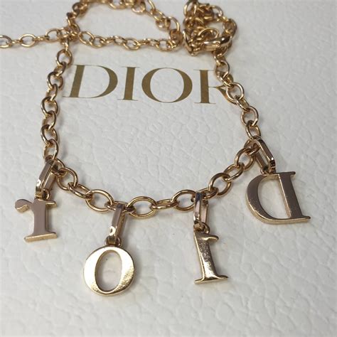 dior necklace gold letters|Dior letters necklace value.